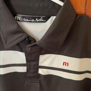 Travis Mathew black and white stripe performance golf polo